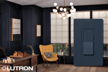 Lutron Sunnata dimmer in Deep Sea satin finish - luxury light switch in modern dark blue living room