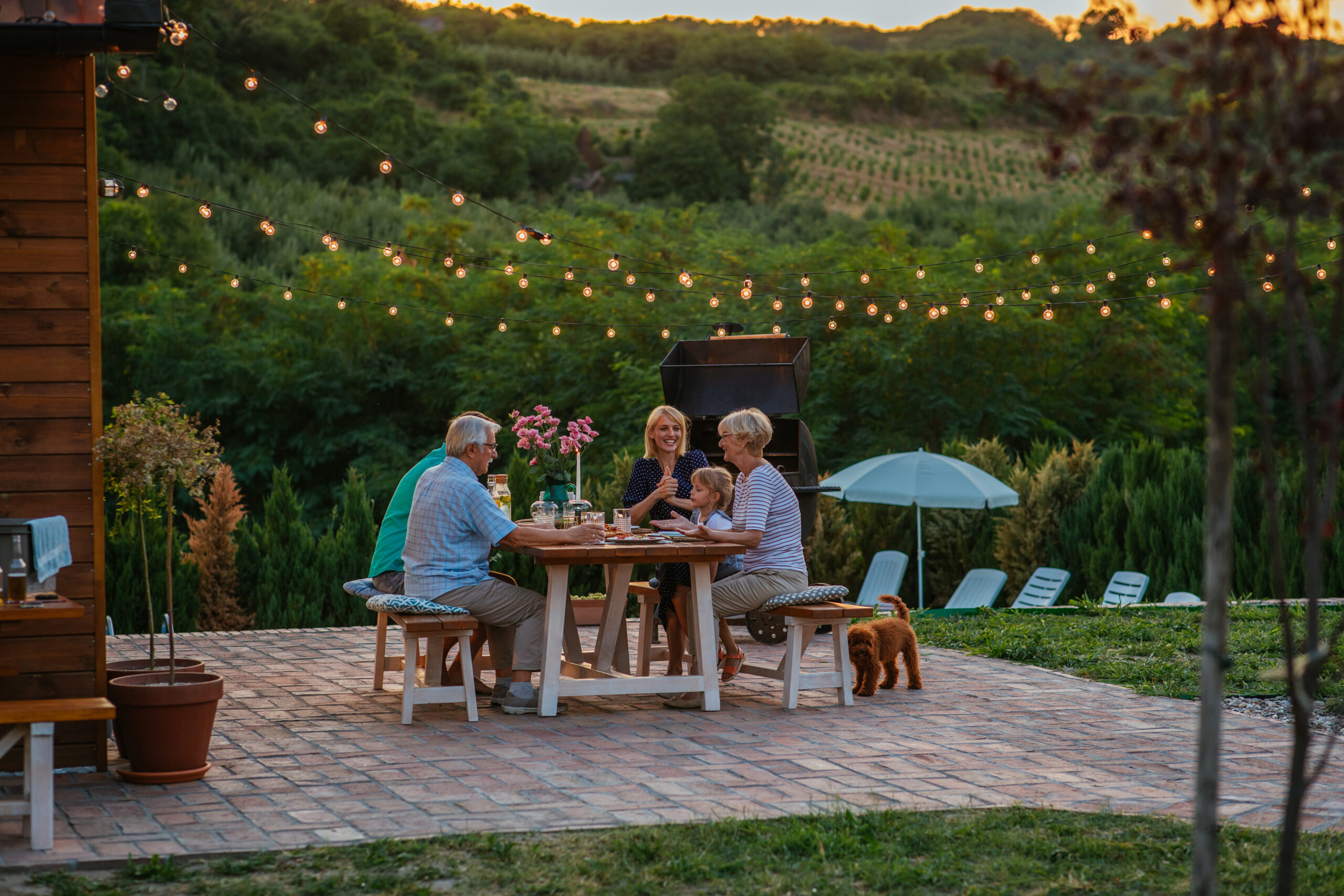 cheerful family enjoying a family dinner outside a 2024 10 18 06 57 13 utc scaled